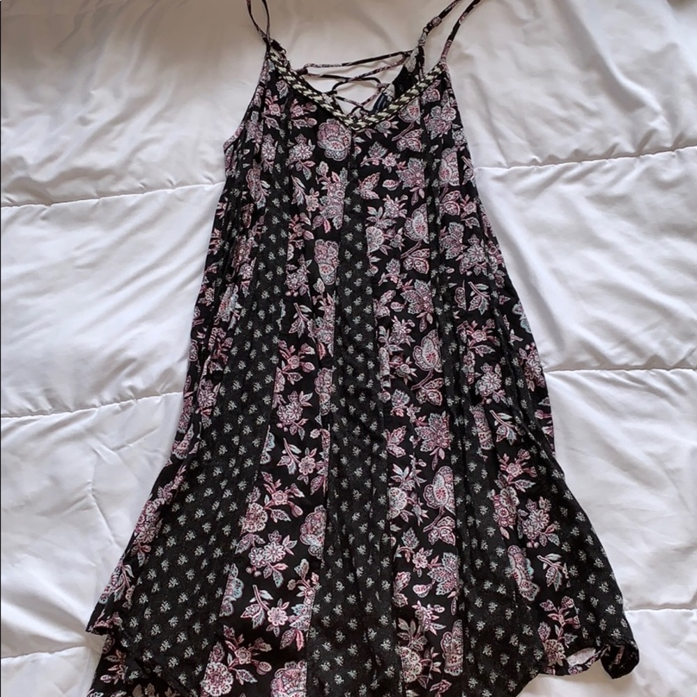 Black with colored flower patterned mini dress.